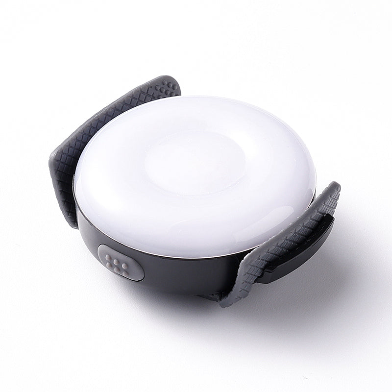 LED‑puck för hundsele som ger stark synlighet i mörker, är vattentålig och enkel att fästa för tryggare promenader